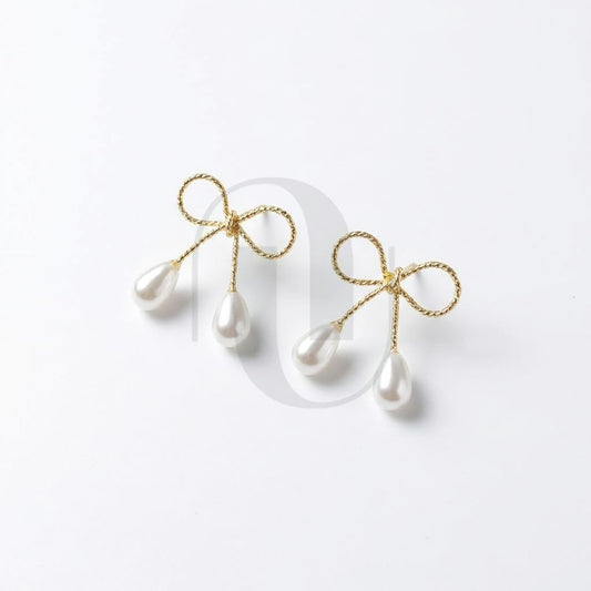 UELSTA Ribbon Pearl Drop Earrings for Women Sustainable 14K Gold Plated Recycled Brass 925 Sterling Silver Posts Faux Pearls Bowknot Design 17mm